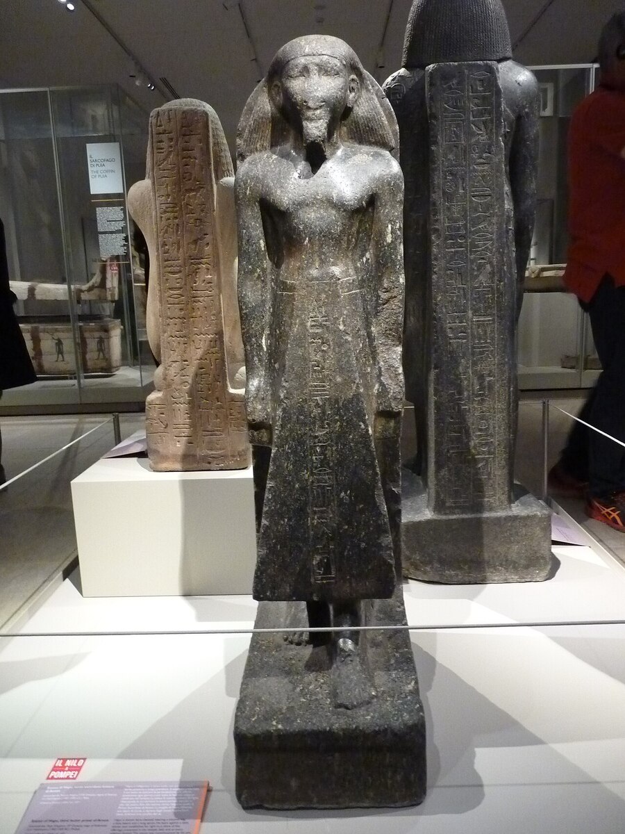 Stone statue of ancient Egyptian priest Hapu at the Museo Egizio Turin