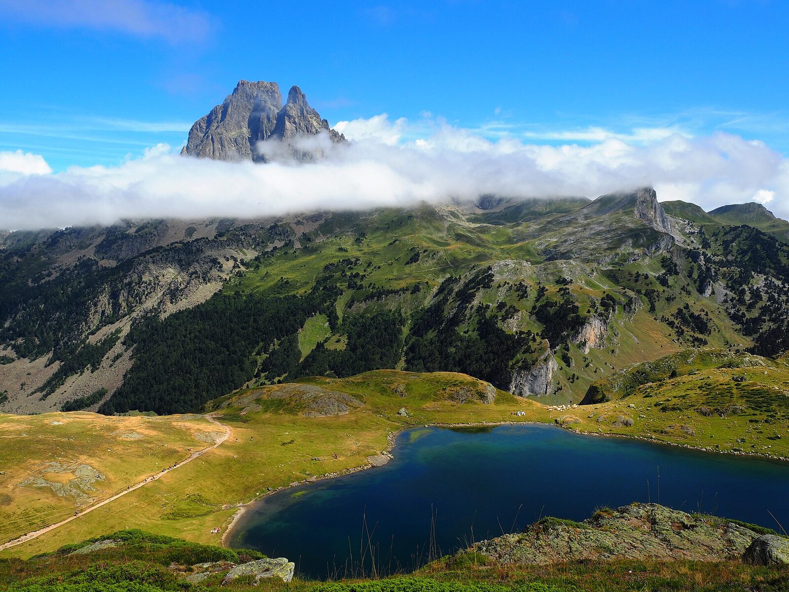 The Pic du Midi d'Ossau reflected in a high-altitude Pyrenean lake
