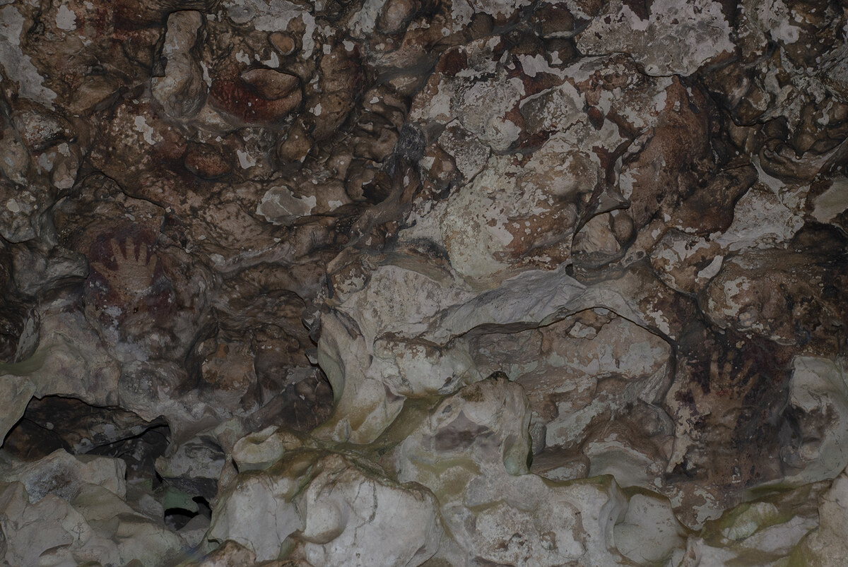 Mains negatives dans la grotte de Leang-Leang, Maros, Sulawesi
